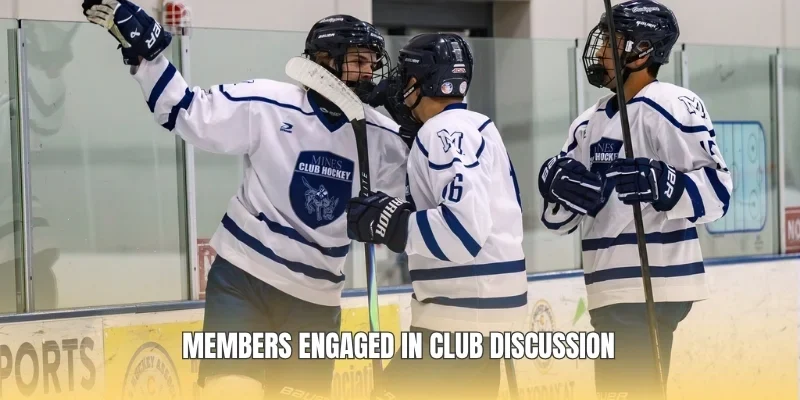 Members engaged in club discussion